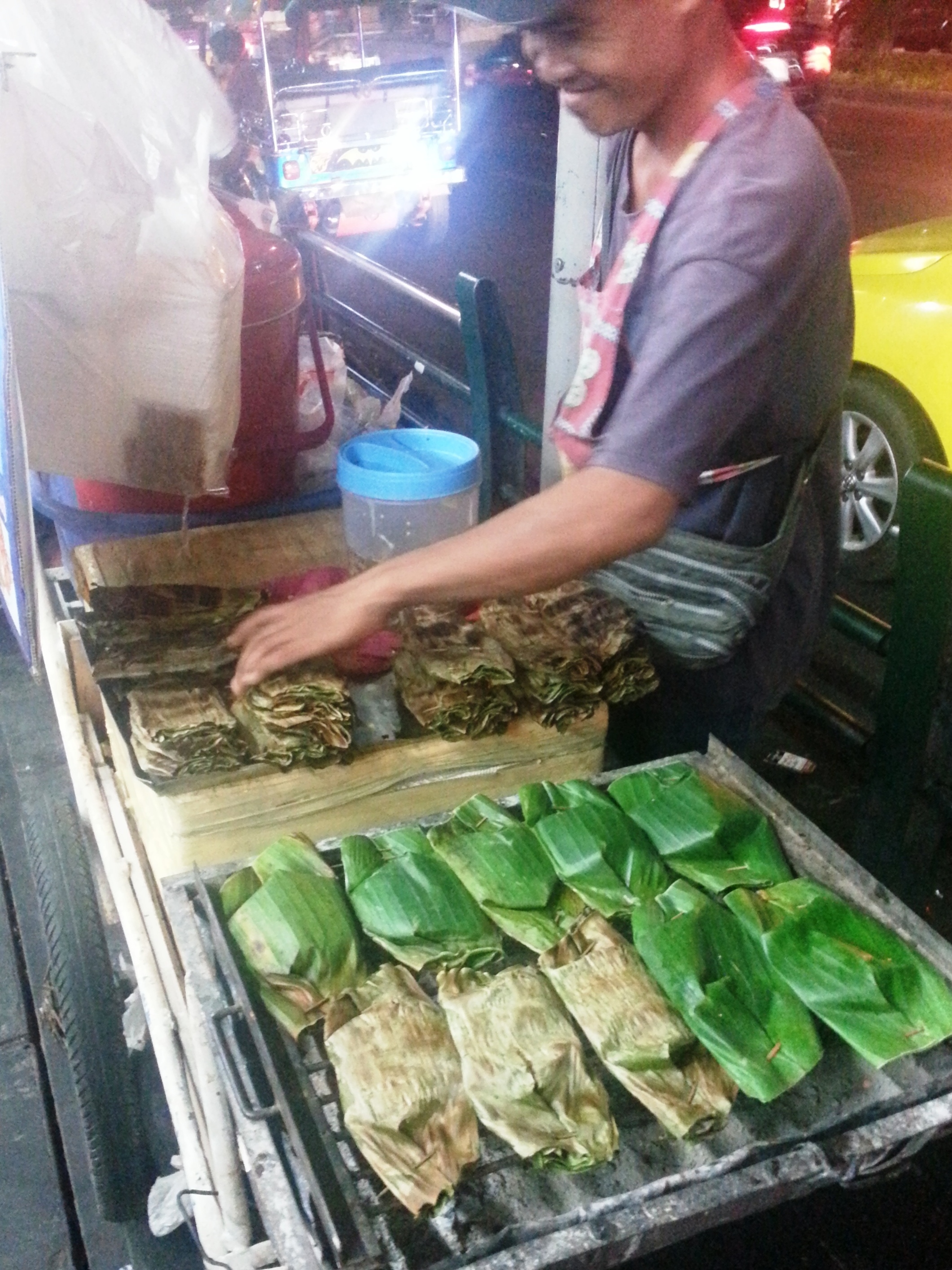 Bangkok street food - fish curry banana leaf stand